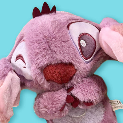 Peluche Stitch Purple – Soulagement de l’Anxiété avec Musique & Lumières 32cm